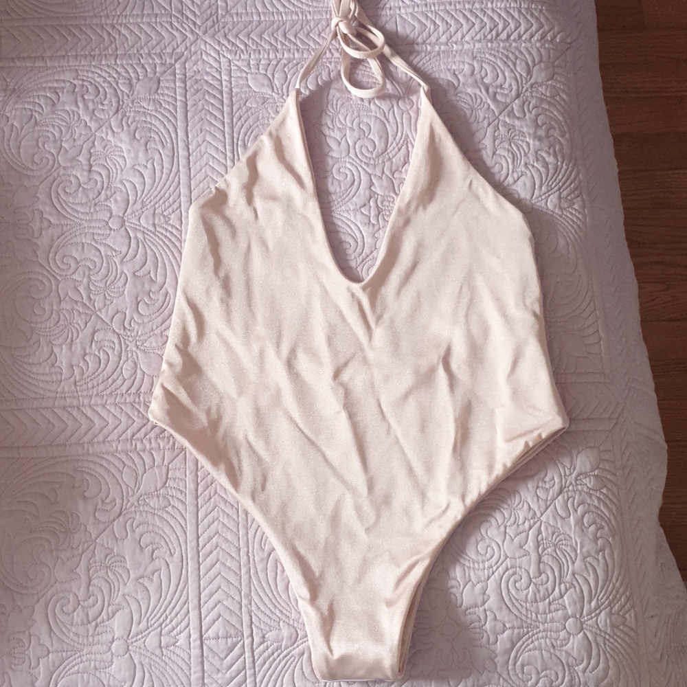 Pale pink halter one piece from TJ swim